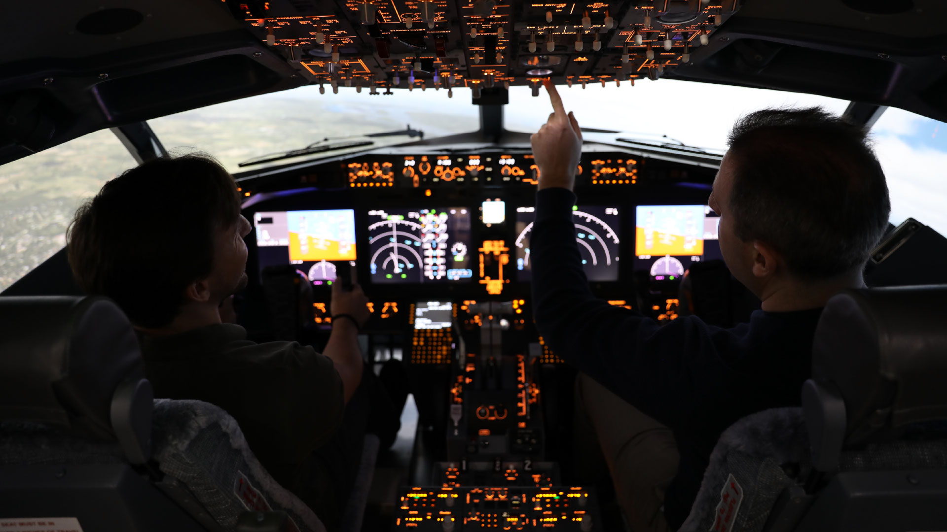 BCIT student receiving an orientation flight in the school's new B737MAX flight training device