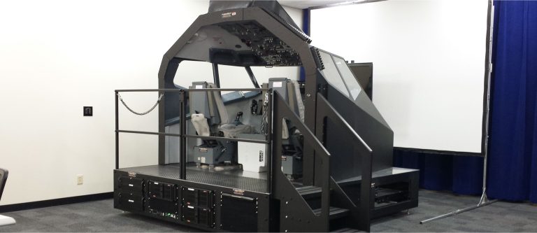 Open-frame FDS B737 flight deck on a raised platform, built for BAE Systems R&D