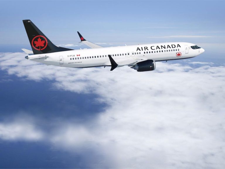 Air Canada Boeing 737 MAX in flight above the clouds